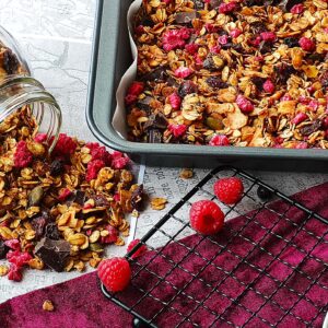 Homemade granola with raspberry and dark chocolate chunk